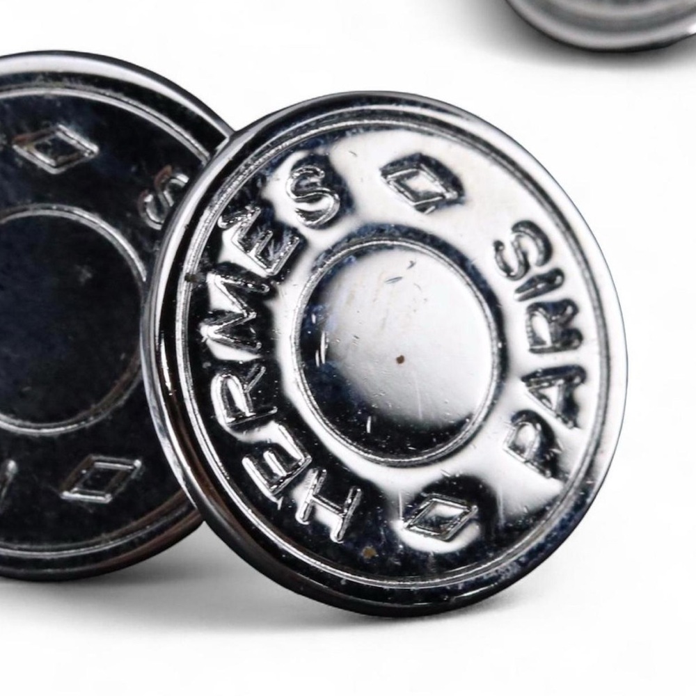 Authentic Hermès Clou de Selle
Bijouterie Fantaisie Cufflinks in Palladium + Box